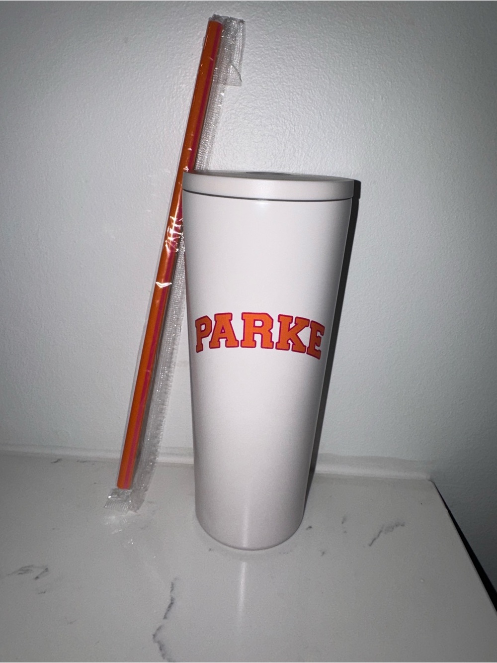 White Tumbler with 'PARKE' Red-Orange Logo and Straw